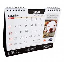 Calendário Base empastada - 15x21cm - 16pg Couchê 150g (Miolo) / Couche empastado (Base) Miolo 15x21cm / Base 39x21cm aberta 4x4 cores (Miolo) / 1x0 cor Preto (Base) Laminação Fosca/Brilho (Base) Wire-o, empastamento, recorte nas folhas de calendário. Totalmente Personalizado